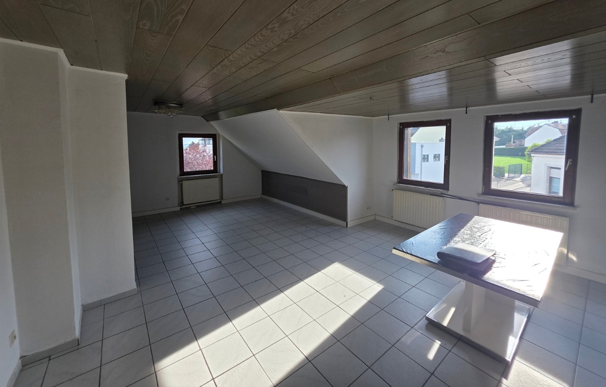 Mehrfamilienhaus in Merchweiler-Dachgeschosswohnung