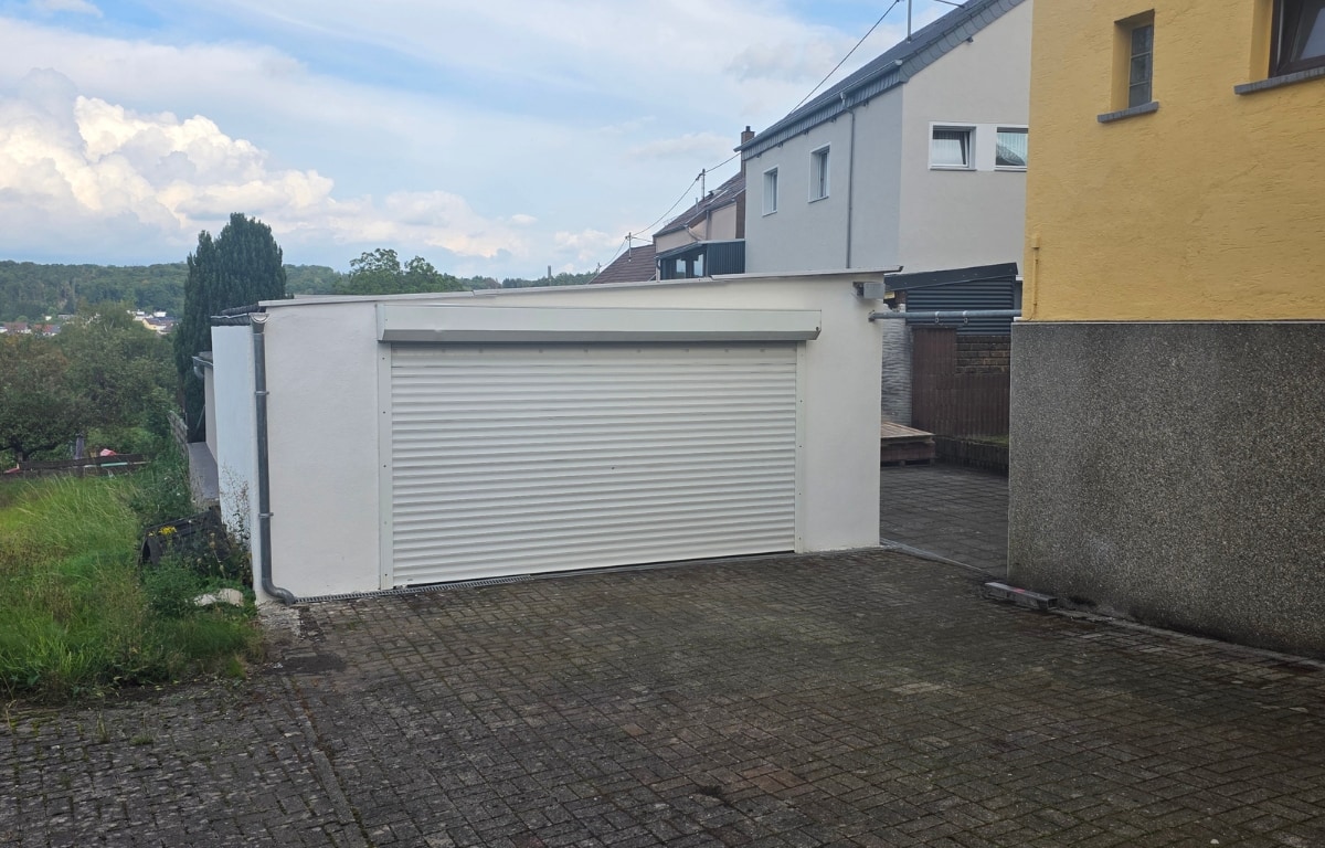 Mehrfamilienhaus in Merchweiler-Doppelgarage